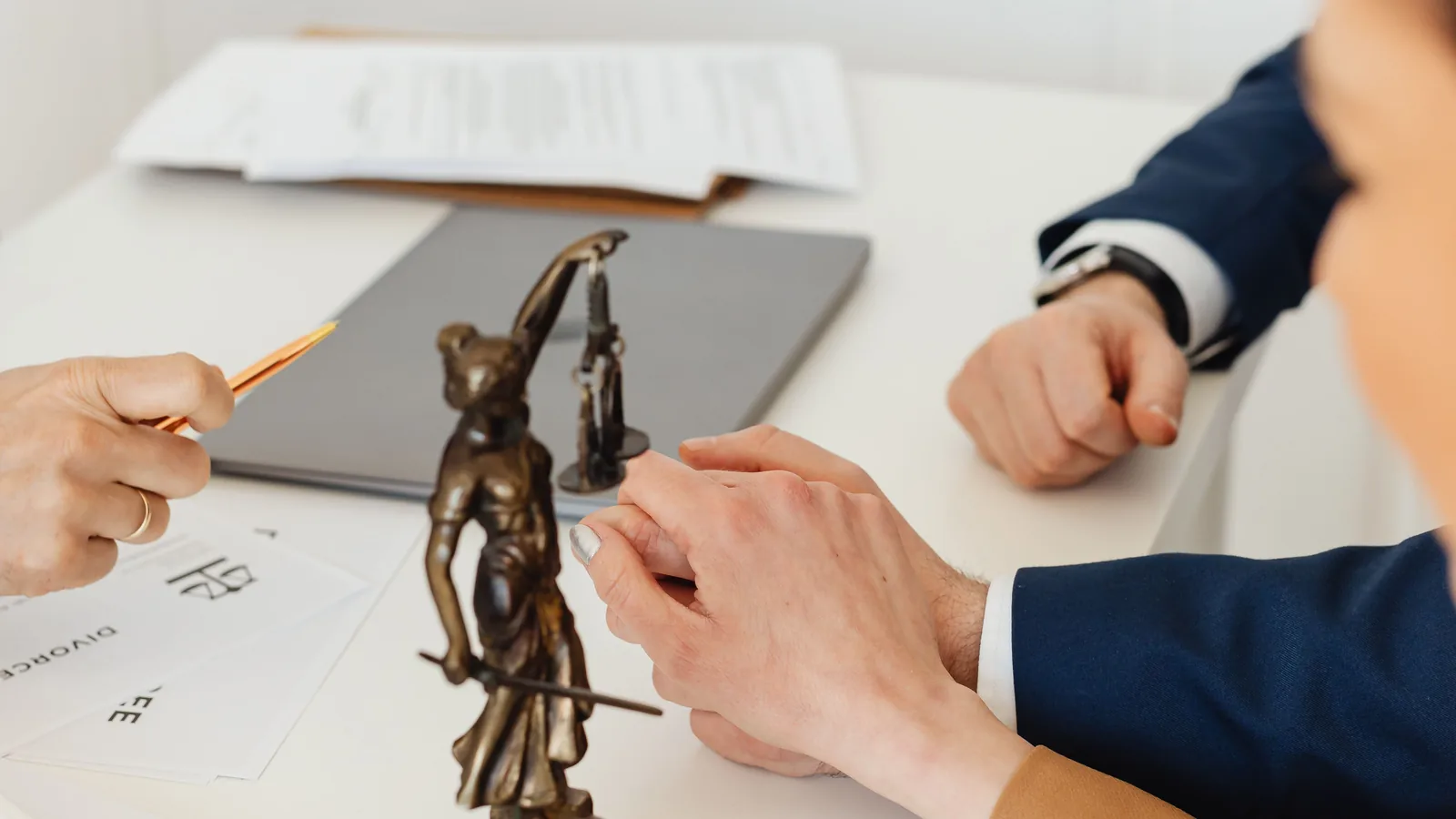 Legal documents being reviewed during a consultation