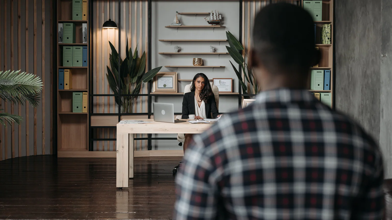 Professional consultation across an office desk